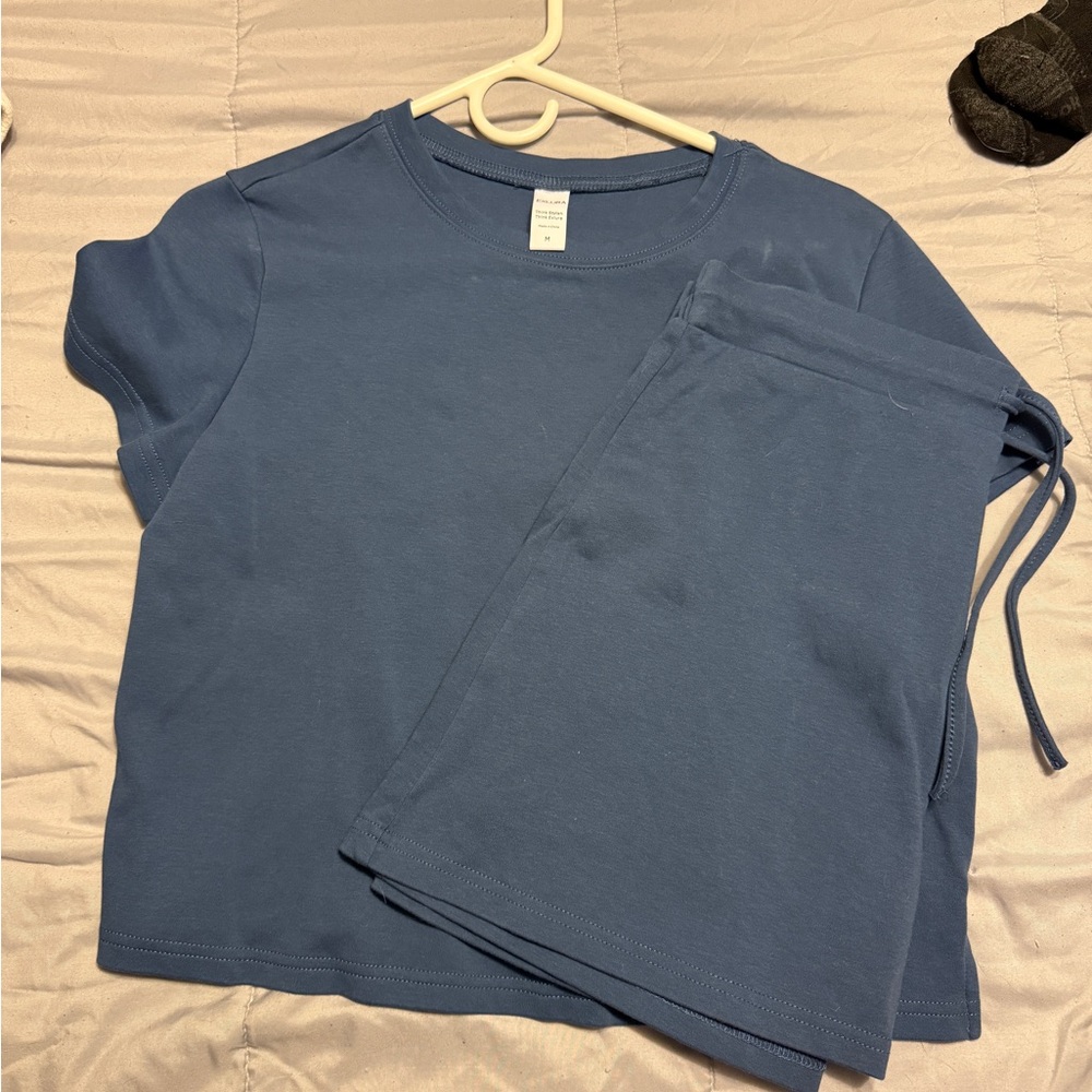 Woman’s Blue T-Shirt and Skirt Set